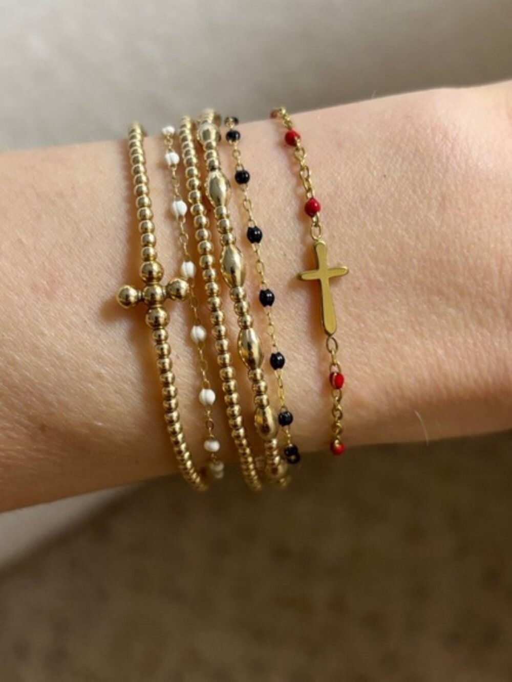 The Martina Dainty gold and red beaded look cross bracelet delicate jeweled